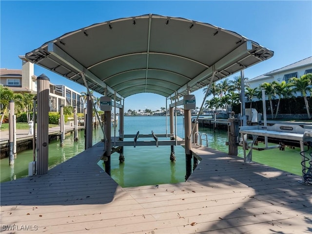 view of dock with a water view