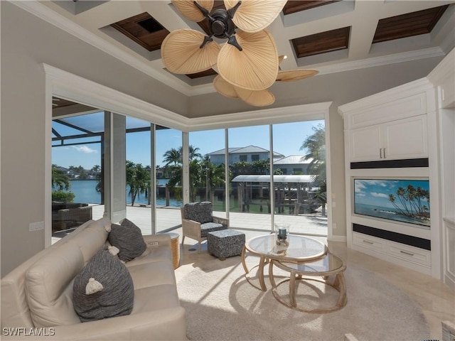 living room with ceiling fan, ornamental molding, and coffered ceiling