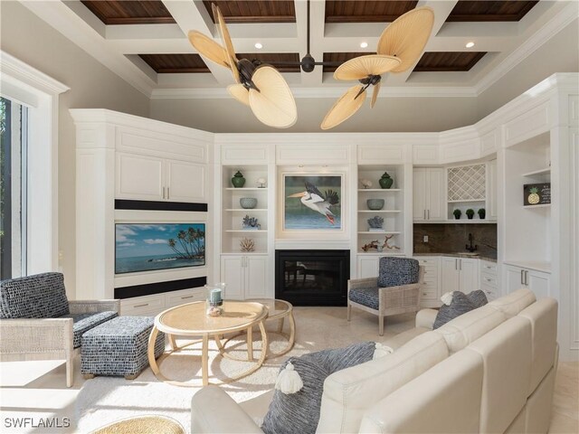 living room featuring a high ceiling, beam ceiling, ceiling fan, and coffered ceiling