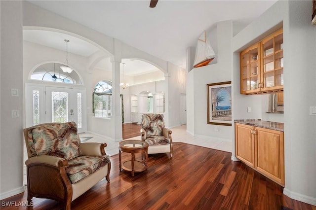 sitting room with hardwood / wood-style flooring