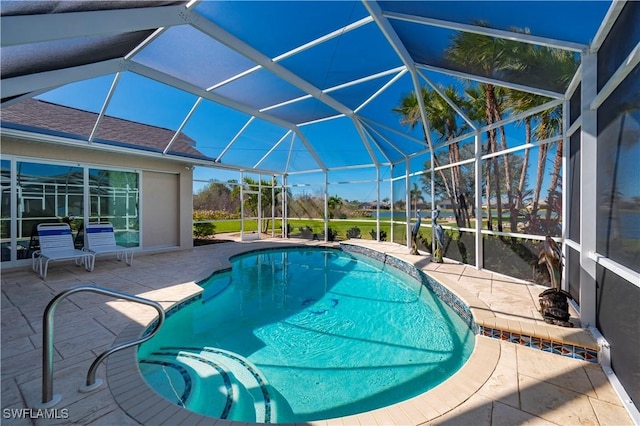 view of pool featuring a lanai and a patio