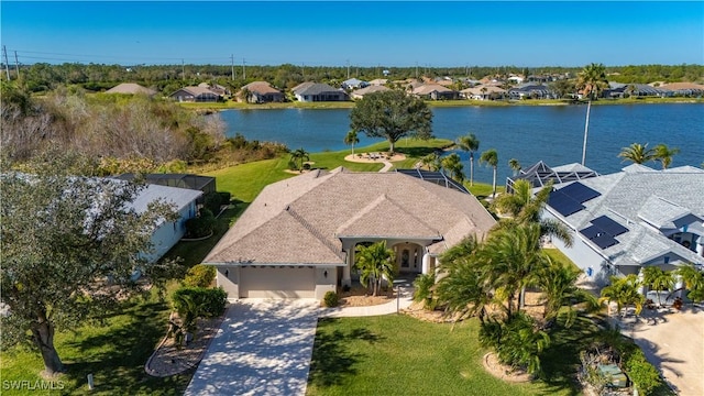 drone / aerial view with a water view