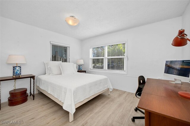 bedroom featuring light hardwood / wood-style flooring