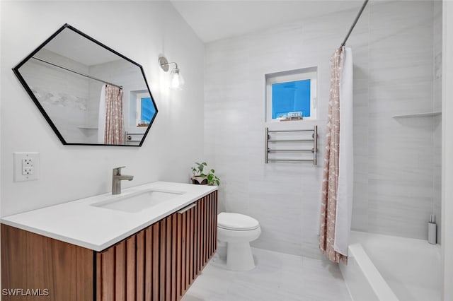 full bathroom with shower / bathtub combination with curtain, vanity, tile walls, and toilet