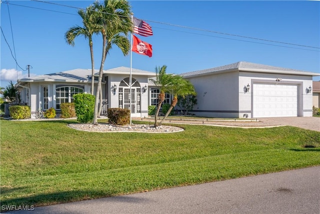 single story home featuring a front yard and a garage