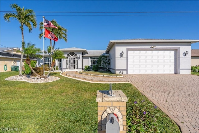 ranch-style home with a front yard and a garage