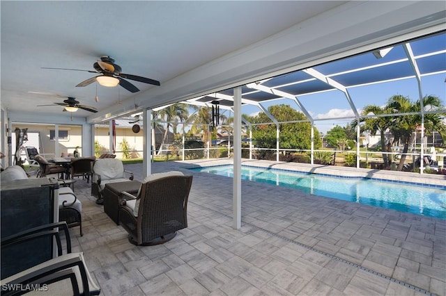 view of pool featuring a lanai and a patio