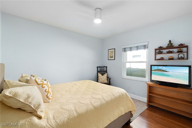 bedroom featuring wood-type flooring and ceiling fan