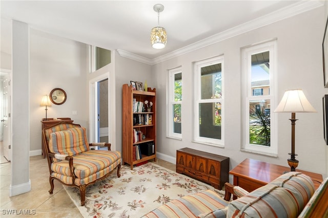 sitting room with light tile patterned flooring and ornamental molding