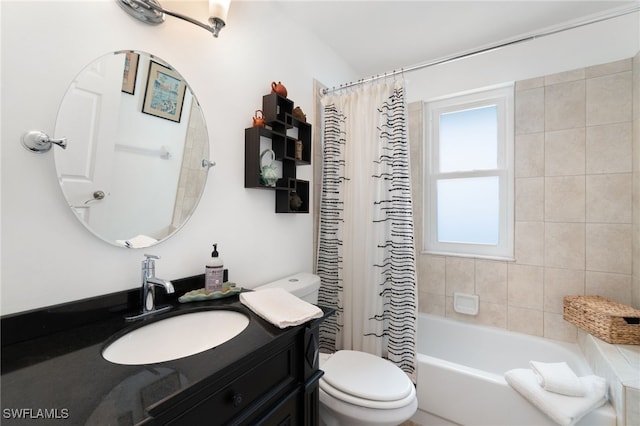 full bathroom featuring vanity, toilet, and shower / tub combo