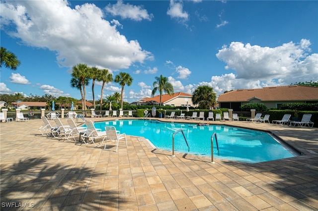 view of pool featuring a patio area