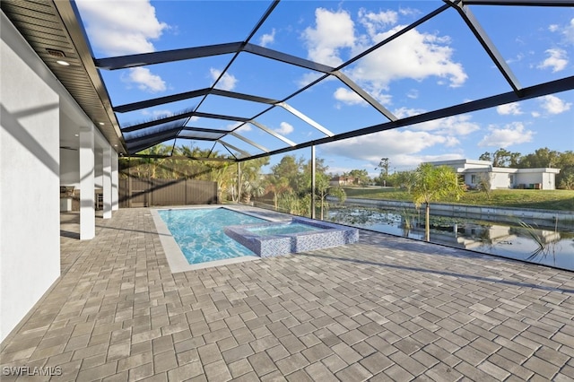 view of pool featuring a lanai, a water view, an in ground hot tub, and a patio