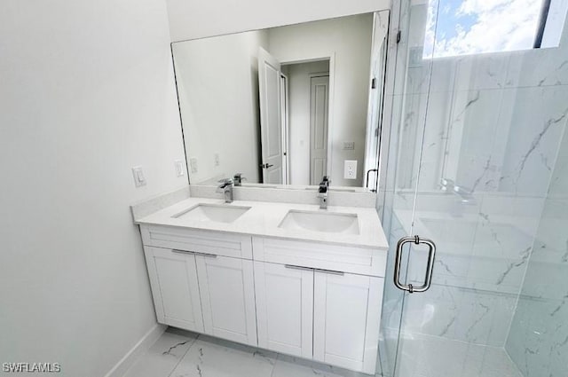 bathroom with vanity and an enclosed shower