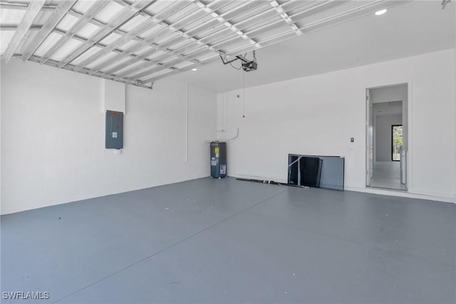 garage with a garage door opener, electric panel, and water heater