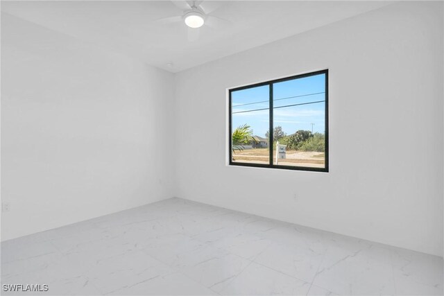 empty room featuring ceiling fan