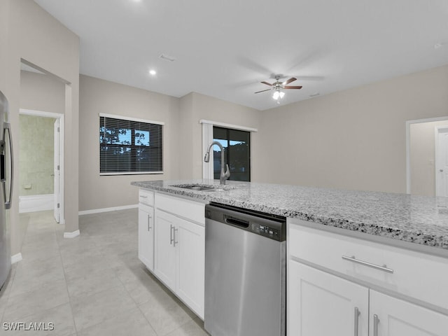 kitchen featuring ceiling fan, sink, light stone counters, white cabinets, and appliances with stainless steel finishes