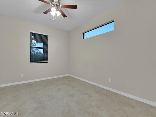 empty room featuring ceiling fan