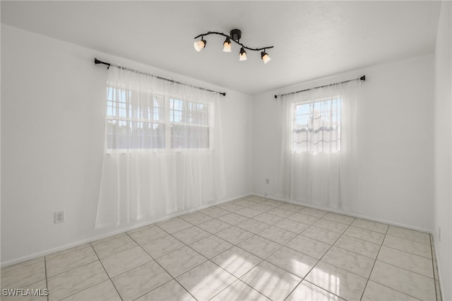 view of tiled spare room