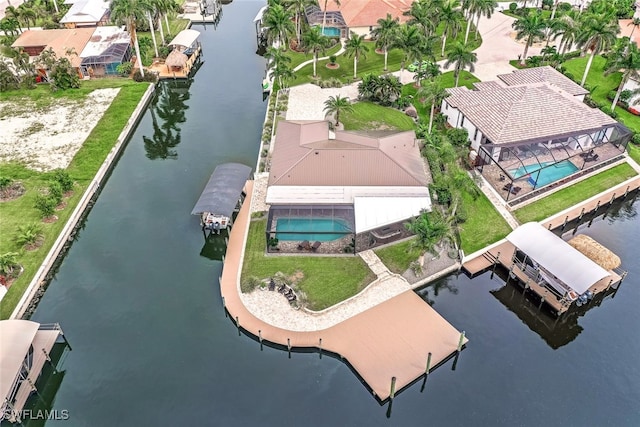 birds eye view of property featuring a water view