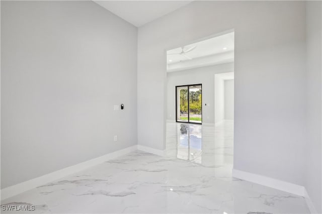 unfurnished room featuring ceiling fan