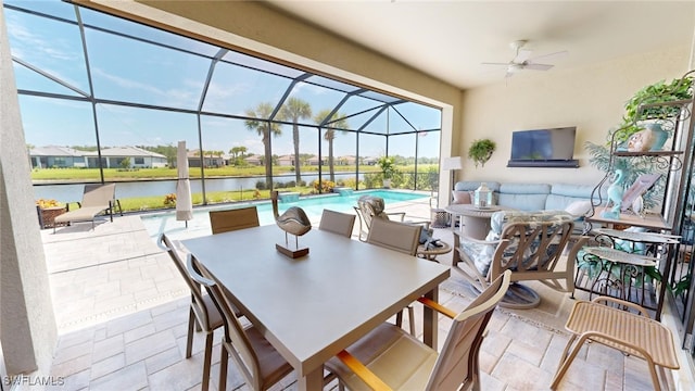 view of patio / terrace with glass enclosure, ceiling fan, and an outdoor hangout area