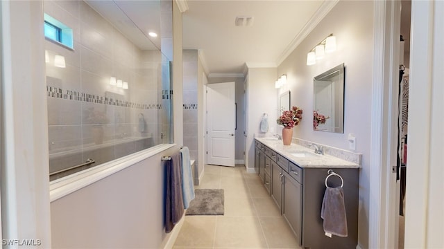 bathroom featuring tile patterned floors, vanity, crown molding, and walk in shower