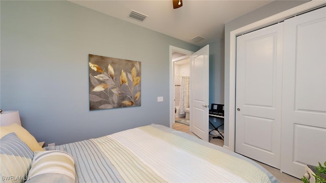 bedroom with light colored carpet, a closet, and ceiling fan