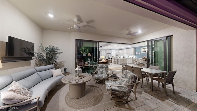 living room featuring ceiling fan