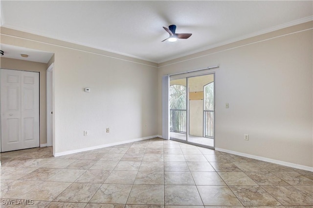 empty room featuring crown molding and ceiling fan