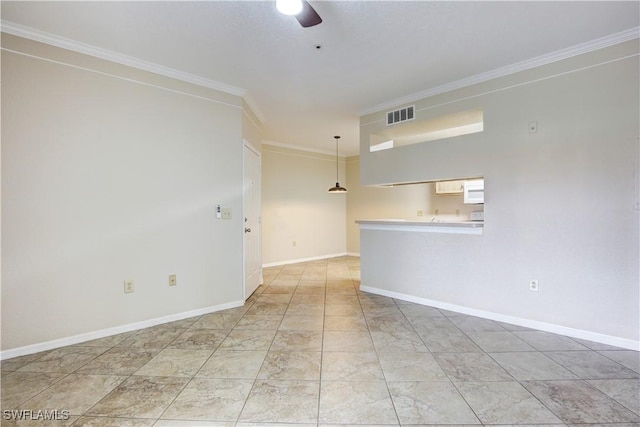 unfurnished room featuring ornamental molding and ceiling fan