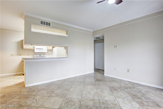 spare room with ceiling fan and ornamental molding