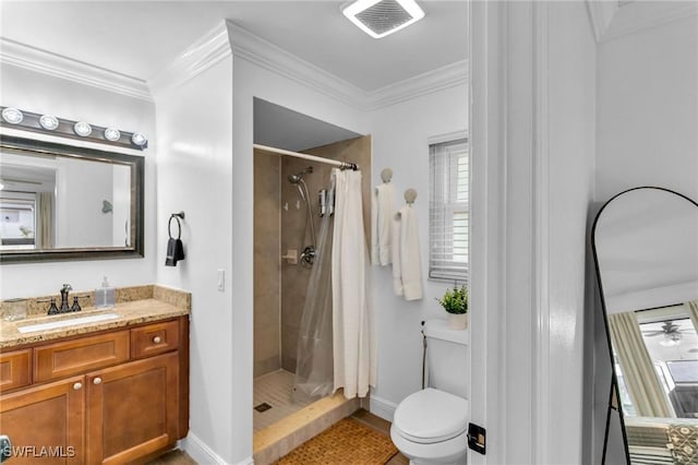 bathroom with vanity, toilet, curtained shower, and crown molding