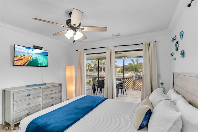 bedroom featuring ceiling fan, access to exterior, and ornamental molding