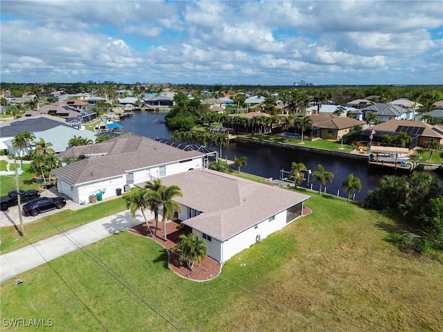 bird's eye view with a water view