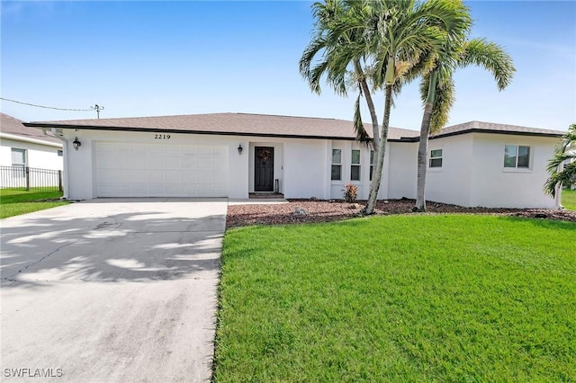 ranch-style home with a front yard and a garage