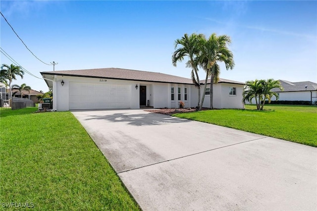 ranch-style house with a front yard and a garage