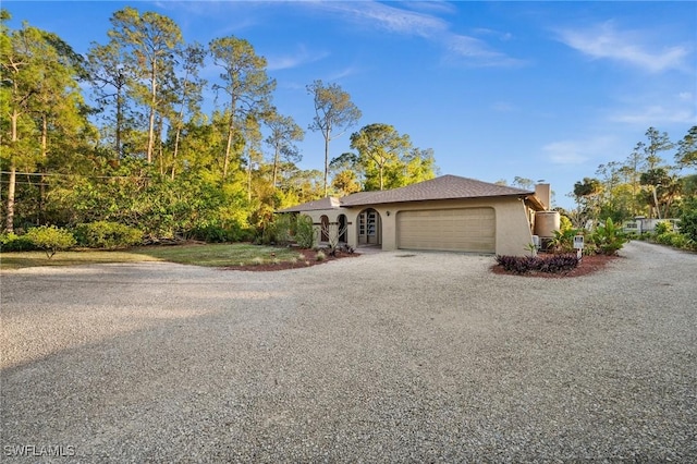 view of front of house with a garage