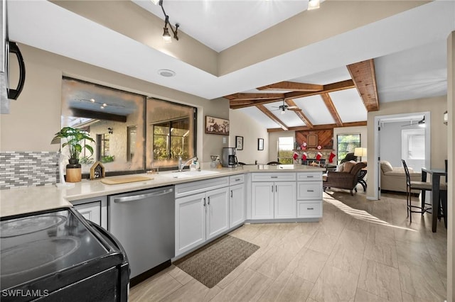 kitchen with black electric range oven, white cabinets, lofted ceiling with beams, stainless steel dishwasher, and ceiling fan