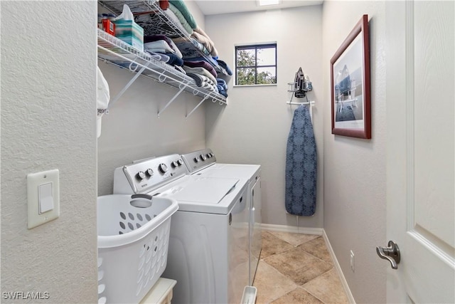 laundry area featuring independent washer and dryer