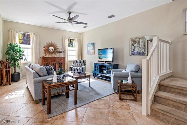 living room featuring ceiling fan