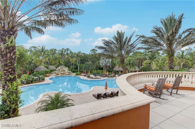 view of swimming pool featuring a patio area