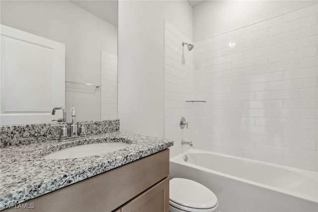 full bathroom with vanity,  shower combination, and toilet