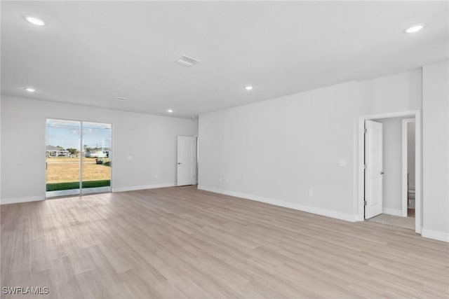 empty room featuring light hardwood / wood-style floors