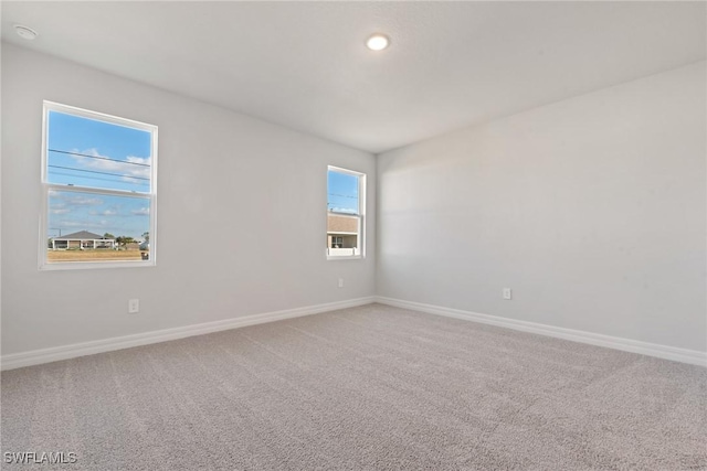 empty room with carpet floors