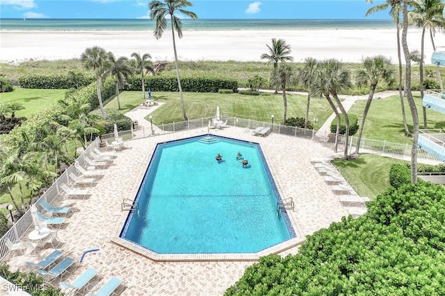 view of pool with a water view