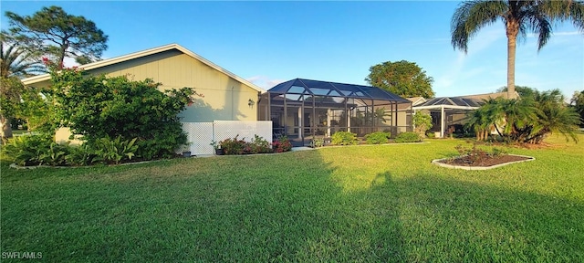 view of yard with a lanai