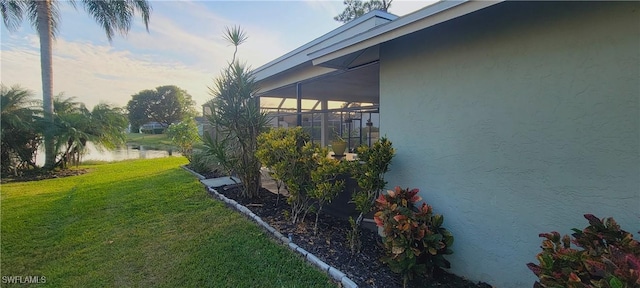 view of yard featuring a lanai