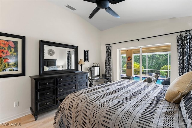 bedroom featuring access to exterior, ceiling fan, light hardwood / wood-style flooring, and lofted ceiling