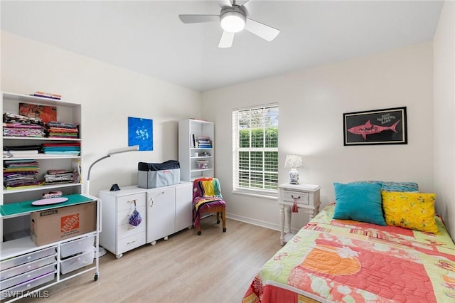 bedroom featuring ceiling fan and light hardwood / wood-style flooring