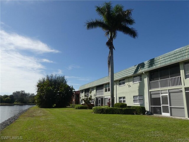 view of property with a water view